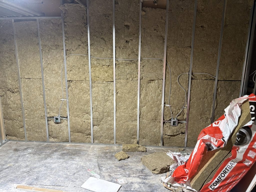 Metal framed wall with batt insulation
