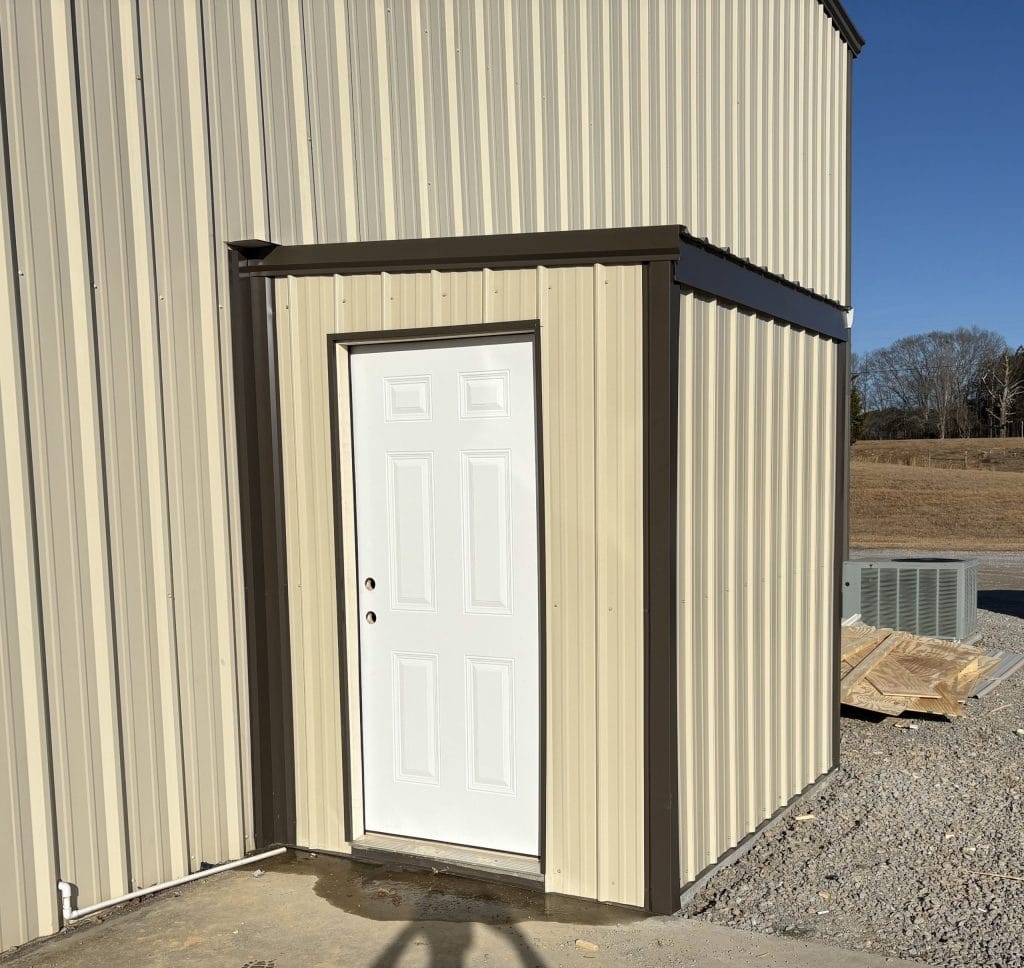 6'x8' ice house building with door, sheeting, and trim.